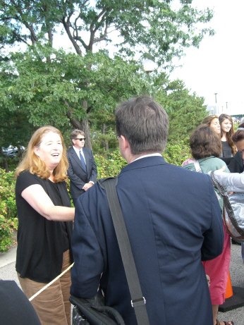 Black-clad Kennedys Greeting Mourners